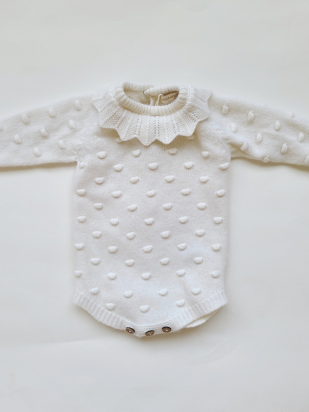 Classic White Knit Baby One-Piece with Ruffle Collar